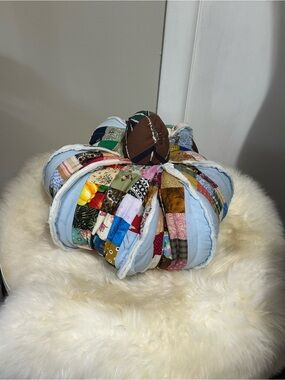 handmade fabric pumpkin crafted from vintage quilt scraps